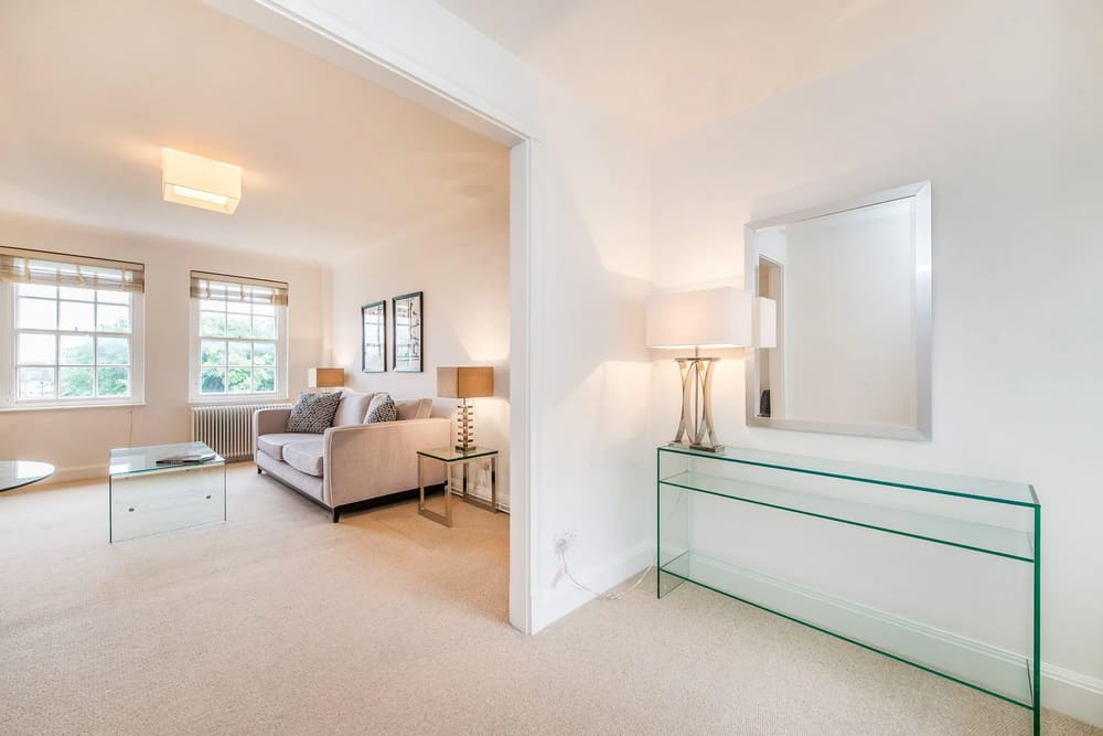 Chelsea Mansion Block, Chelsea: Living room seen through an open doorway