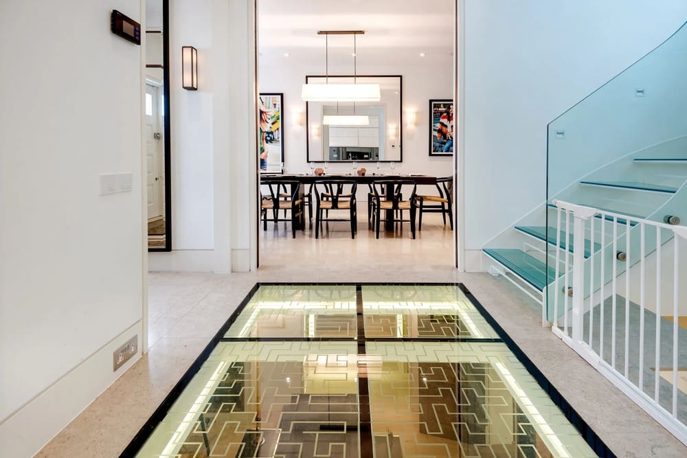 3-bedroom house near High St Kensington, Kensington: Glass floor panel looking through to the dining area