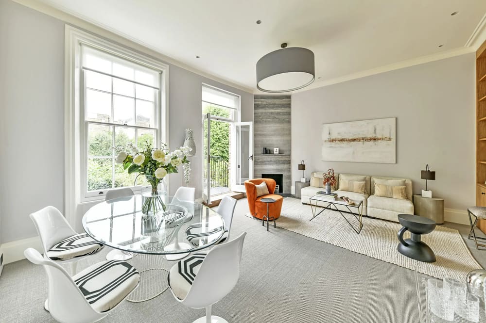 The Little Boltons Apartment, Chelsea: Living room with glass dining table and tall windows