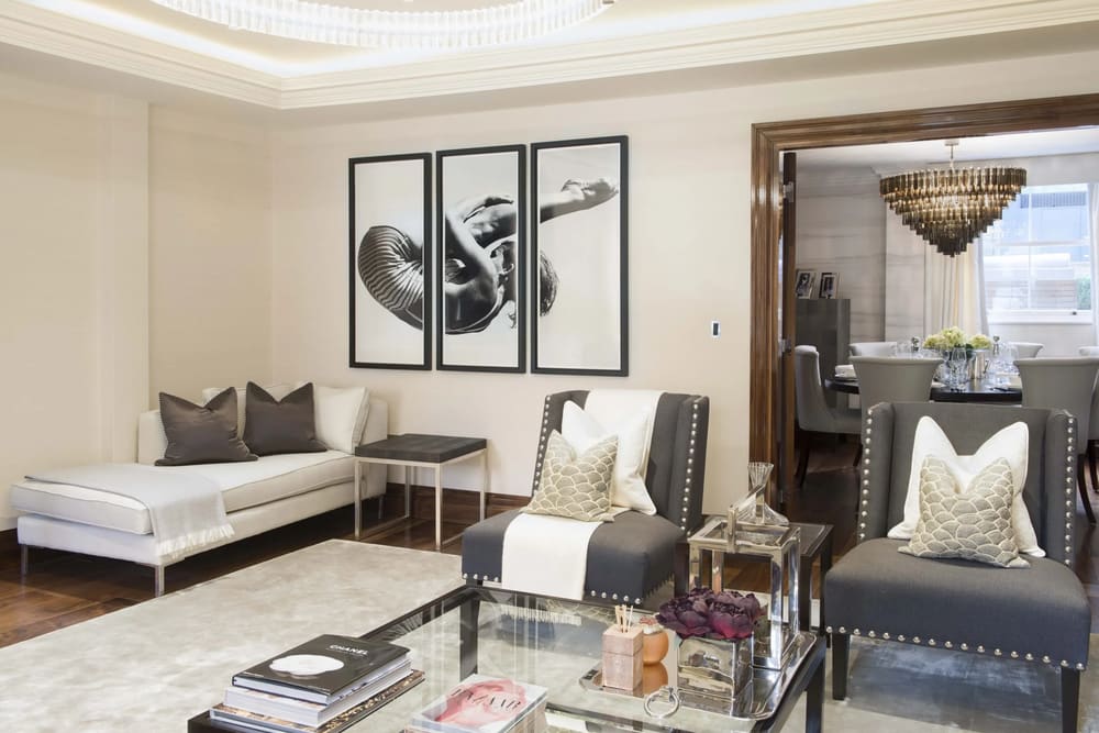 Grosvenor Hill, W1K, Mayfair: Living room with cream sofas and monochrome prints
