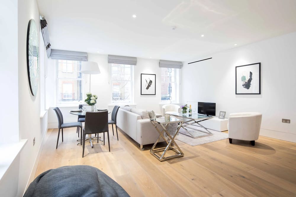 Dean St, Soho (2 bedroom Apartment), West End: Living and dining room with pale wood floor