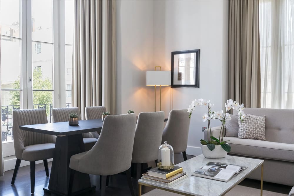 The Chilworth Apartments, Paddington: Dining table with grey chairs and sitting area