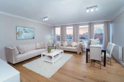 Crawford Place Apartments, Marylebone: Open living space with pale sofa and armchair