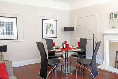 Abingdon Mansions, Kensington: Open living and dining room with wooden floor