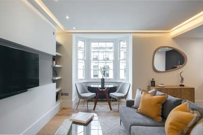 The Armitage Marylebone, Marylebone: Dining area with round table and yellow armchair