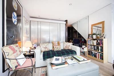 Elbe Street House, Fulham: Kitchen and dining area beside glazed garden doors