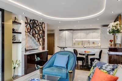Horsley Court Two Bedroom Apartment, Westminster: Kitchen with fitted cabinets and wooden dining table