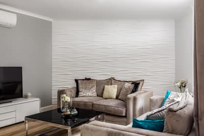 Norfolk Crescent Six Bedroom House, Paddington: Living room with sofa and dark feature wall