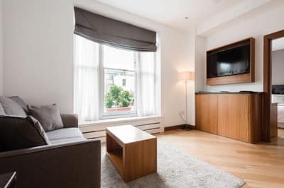 Presidential Kensington Apartments, Earl's Court: Living room with sofa and dining table