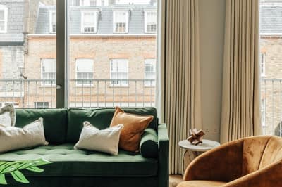 Apartment Two, Three Kings Yard, Mayfair: Living room with seating and dining table