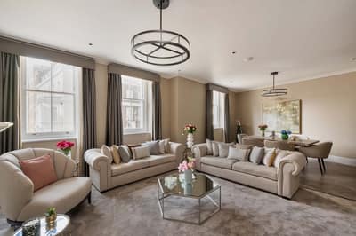 33 Charles Street Apartments, Mayfair: Flat 2 at 33 Charles Street: Living room with sofas around the fireplace, photo 3