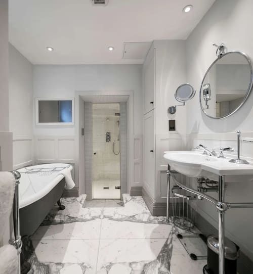 Prime Mayfair 1 bedroom no.4, W1K, Mayfair: Bathroom with roll-top bath and shower