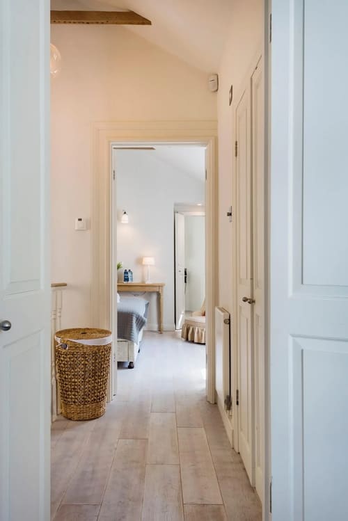 Secluded 2 bedroom Belgravia House, Chelsea: Bedroom seen through open doors