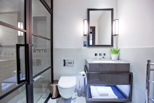 The Golden Square Apartments, West End: Bathroom with Crittall-style glass door