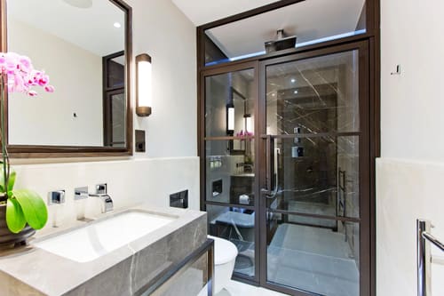 The Golden Square Apartments, West End: Bathroom with bath and black-framed shower
