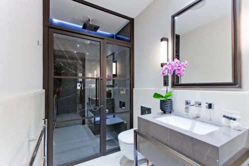 The Golden Square Apartments, West End: Shower room with black-framed glass screen
