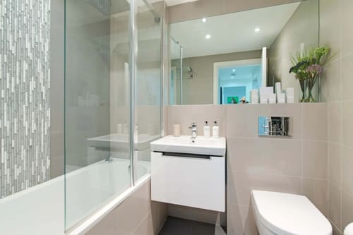 Colonnade, Bloomsbury: Bathroom with glass shower screen and wall basin