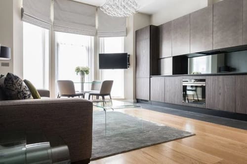 One Harrington Gardens, Kensington: Open-plan kitchen and living room with grey rug