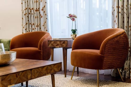 Hyde Park Gate Residences, Kensington: Rust velvet armchairs by the window