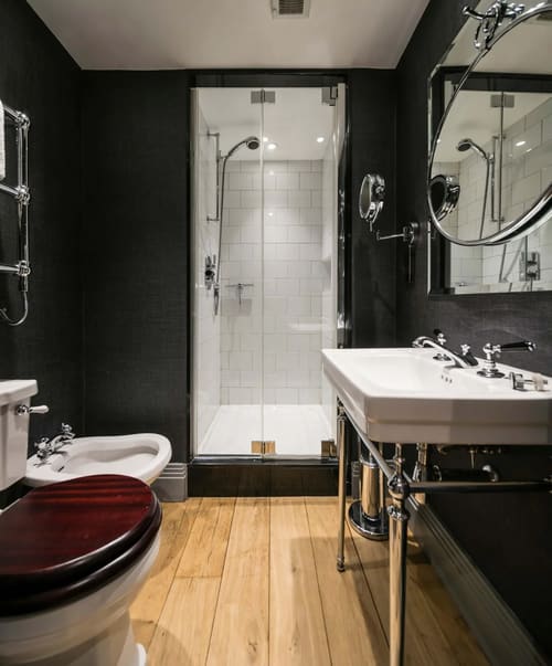 Prime Mayfair 1 bedroom no.3, W1K, Mayfair: Shower room with black walls and washstand