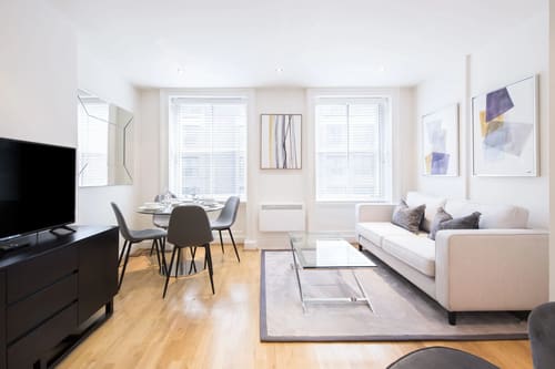 Nottingham Place Apartments, Marylebone: Living and dining room with pale wood floor