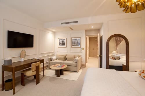 The Capital Apartments, Knightsbridge: Studio with sofa, desk and wall-mounted TV
