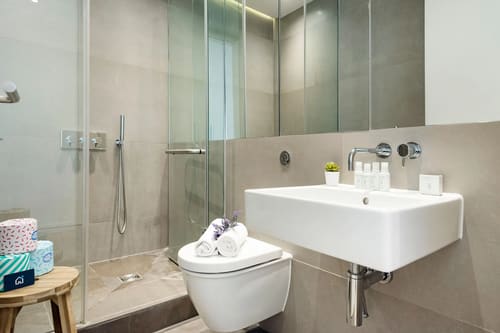 Fitzrovia 2 bedroom near Oxford Street, Fitzrovia: Shower room with glass screen and wall-hung basin