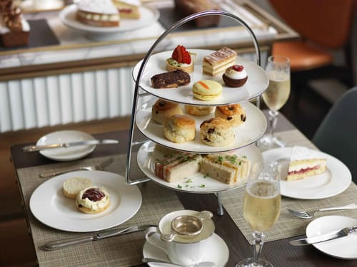 The Athenaeum Apartments, Mayfair: Afternoon tea stand with scones and sandwiches
