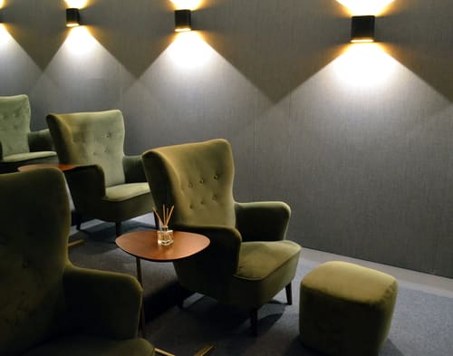 The Hoxton Residences, East London: Lounge with green velvet armchairs