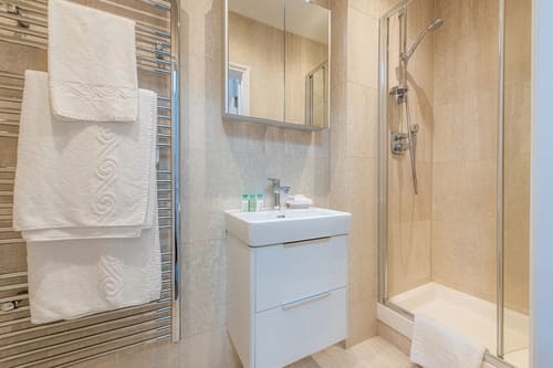Hertford Street, Mayfair: Shower room with heated towel rail