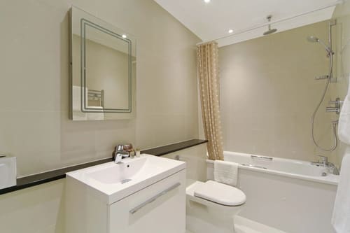 Queensgate Court, Kensington: Bathroom with bath and vanity basin