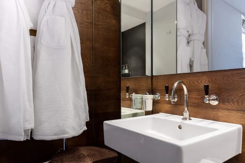 Prime Mayfair 2 bedroom, Mayfair: Wall-hung basin with wood panelling