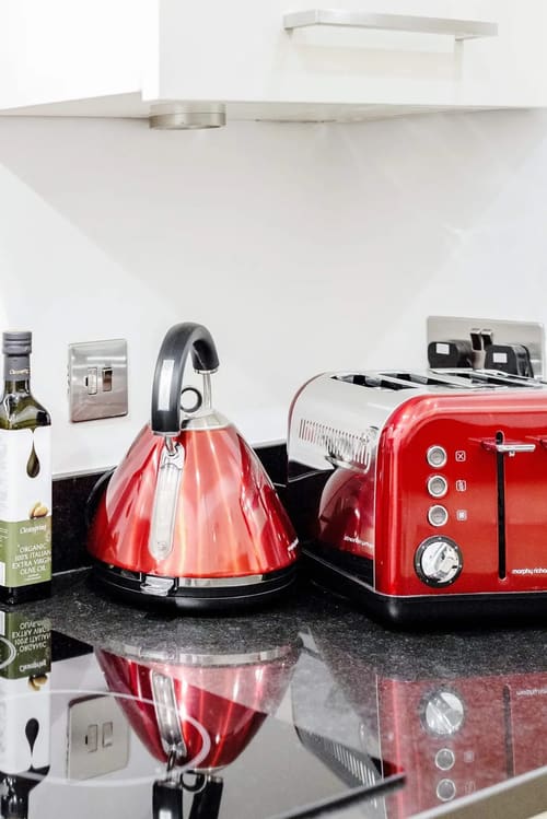 Mayfair Mews Apartment II, Mayfair: Red kettle and toaster