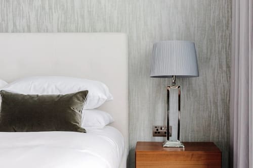 Mayfair Mews Apartment II, Mayfair: Bedside lamp beside a made-up bed