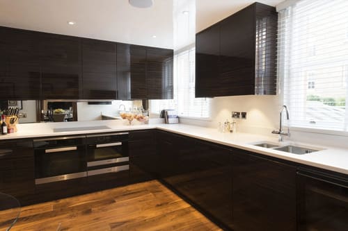 Grosvenor Hill, W1K, Mayfair: Kitchen with black gloss units