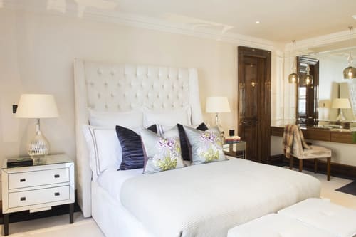 Grosvenor Hill, W1K, Mayfair: Bed with tall buttoned headboard
