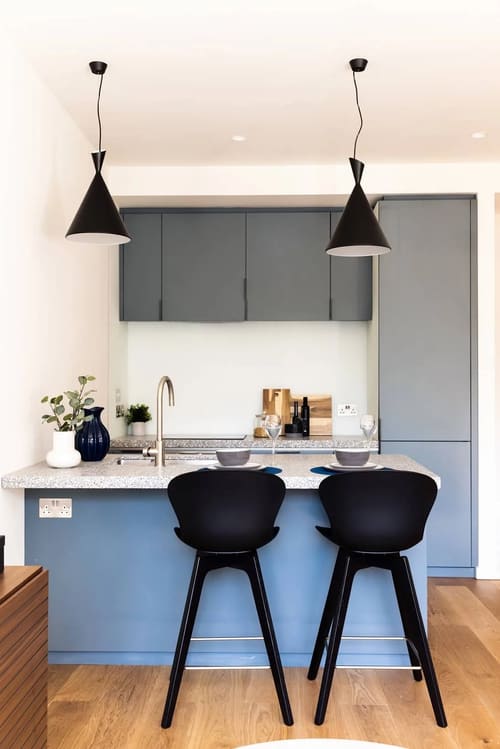 Ewer Street Apartments, Waterloo: Kitchen with grey cabinets and terrazzo worktop