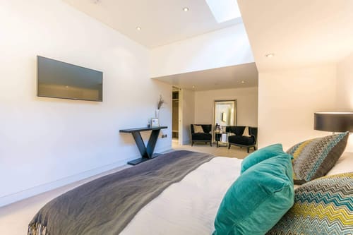 Kenrick Place, Marylebone: Bedroom opening onto a living area
