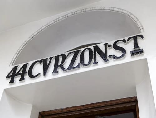 The Curzon Street Apartments, Mayfair: Building signage on Curzon Street