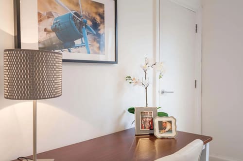Picton Place, Mayfair: Dressing table with photo frames and orchid