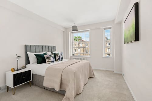 Dolphin House and Dolphin Square Apartments, Pimlico: Double bedroom with grey headboard and two windows