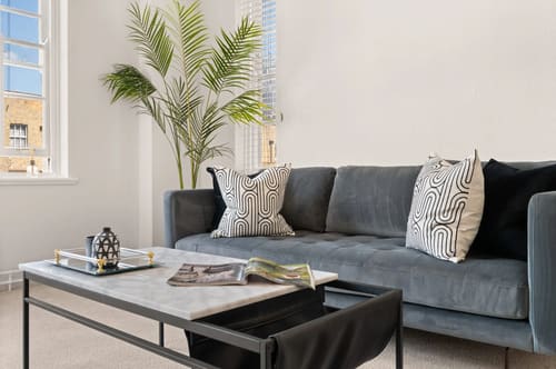 Dolphin House and Dolphin Square Apartments, Pimlico: Grey velvet sofa with marble coffee table