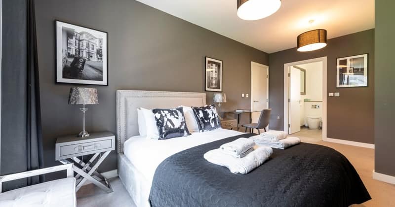 Nine On Danvers, Battersea: Double bed with white linen and bedside lamps