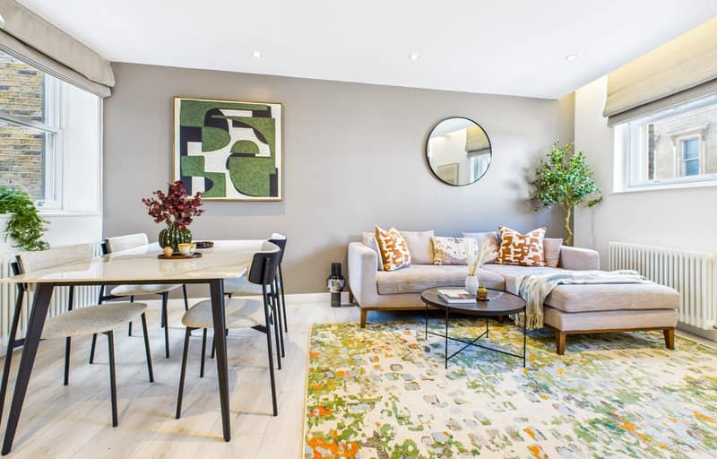 The Residences, London Bridge, London Bridge: Pale sofa beside a round dining table