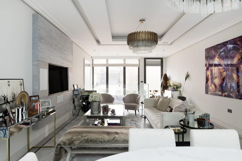 Westbourne Grove Mews, Notting Hill: Sitting room with marble table and recessed lighting