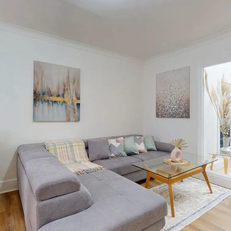 34–36 Clarges Street Apartments, Mayfair: Living room with corner sofa and coffee table