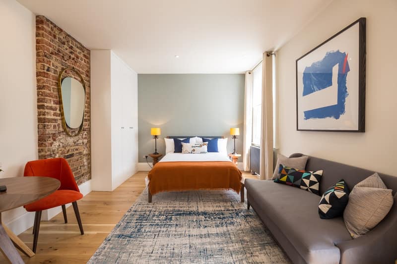 The Armitage Notting Hill, Notting Hill: Studio with bed beside sofa and fireplace