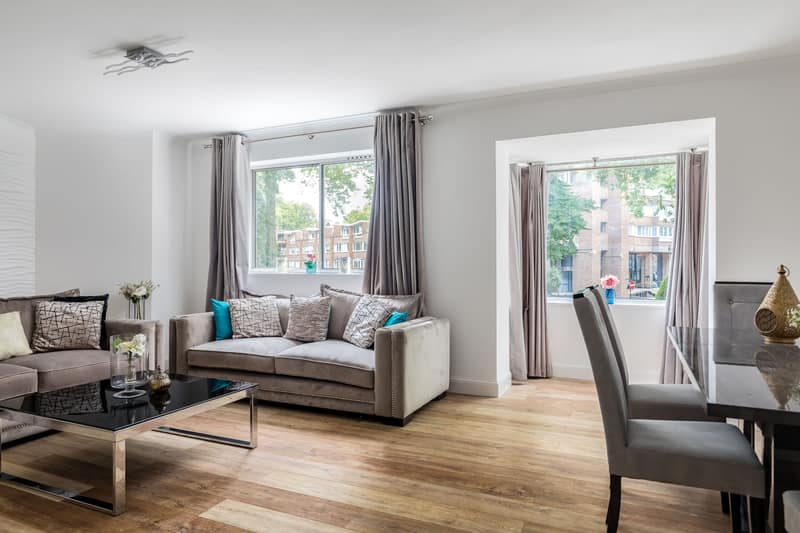 Norfolk Crescent Six Bedroom House, Paddington: Living room with pale sofa and glazed doors