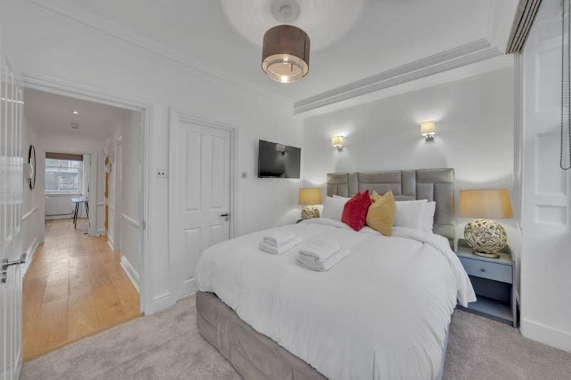 Apartment near Park Lane — MCR London, Mayfair: Bedroom with double bed and bedside lighting