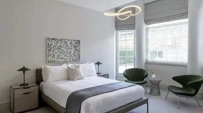 AKA Marylebone, Marylebone: AKA Marylebone: Suite bedroom with bedside chair, photo 3